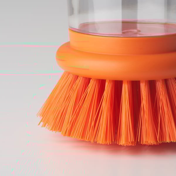 Dish-washing brush with dispenser